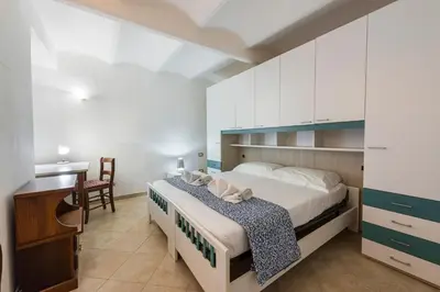 Letto o letti in una camera di Mattonaia by Mmega