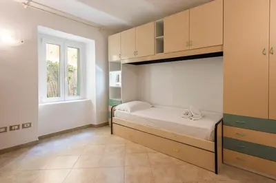 Letto o letti in una camera di Mattonaia by Mmega