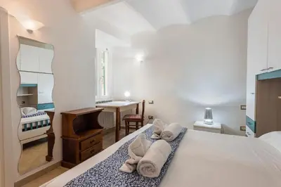 Letto o letti in una camera di Mattonaia by Mmega