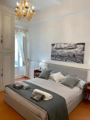 Letto o letti in una camera di Benvenuti nel paradiso in città