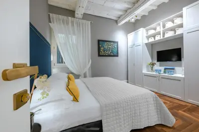 Letto o letti in una camera di Apartments Florence - Golden Grove apartment 3bd