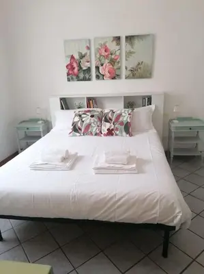 Letto o letti in una camera di Casa Clori - 4 posti letto a due passi dal Duomo