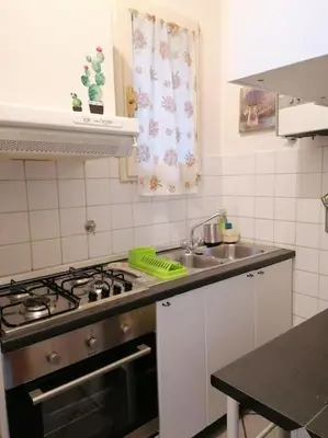 Cucina o angolo cottura di Casa Clori - 4 posti letto a due passi dal Duomo