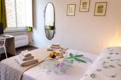Letto o letti in una camera di All'Ombra del Campanile di Giotto