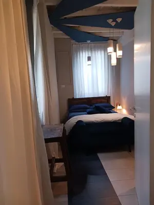 Letto o letti in una camera di Pergola 2