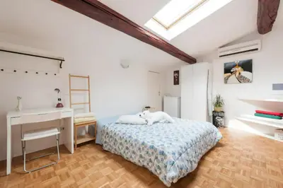 Letto o letti in una camera di Little Paradise