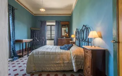 Letto o letti in una camera di Villa Del Mosaico