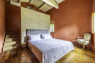 Letto o letti in una camera di Villa Legacy