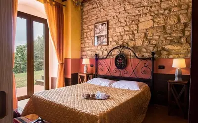 Letto o letti in una camera di Villa Dallara