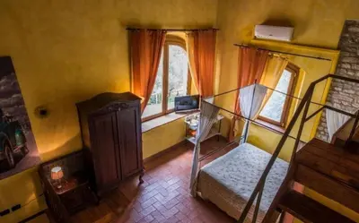 Letto o letti in una camera di Villa Dallara