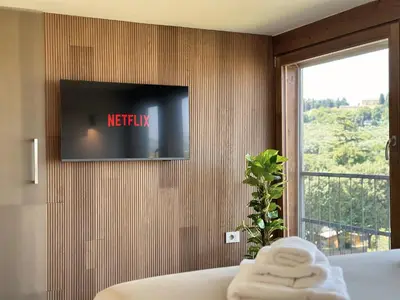 Letto o letti in una camera di Il Quadro sull'Arno