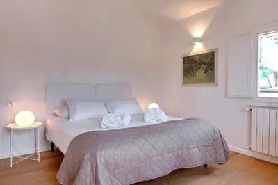 Letto o letti in una camera di Pinti Apartment by Mamo Florence
