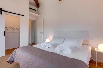 Letto o letti in una camera di Pinti Apartment by Mamo Florence
