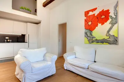 Area soggiorno di Pinti Apartment by Mamo Florence