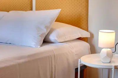 Letto o letti in una camera di Pinti Apartment by Mamo Florence