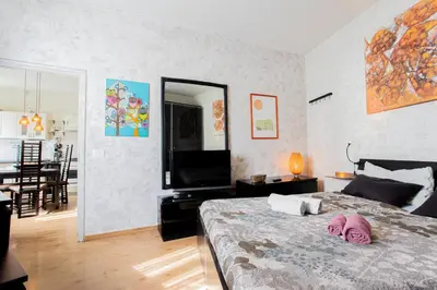 Letto o letti in una camera di Casa moderna vicino Firenze