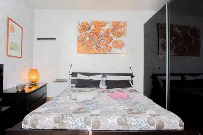 Letto o letti in una camera di Casa moderna vicino Firenze