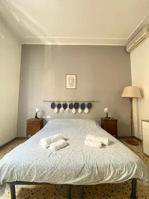 Letto o letti in una camera di Florentia House