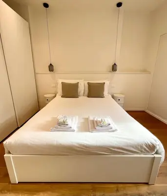 Letto o letti in una camera di Domus Lucrezia