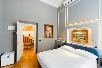 Letto o letti in una camera di AM Collection Cavour