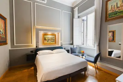 Letto o letti in una camera di AM Collection Cavour