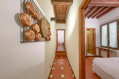 Letto o letti in una camera di Rustic Medieval House-Dimora Medievale Fiorentina