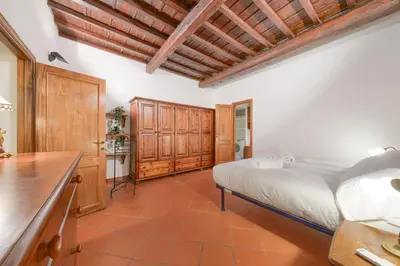 Letto o letti in una camera di Rustic Medieval House-Dimora Medievale Fiorentina