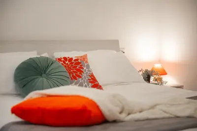 Letto o letti in una camera di Il Giglio - Tintori apt