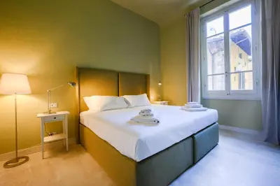 Letto o letti in una camera di Capponi Charming Apartment
