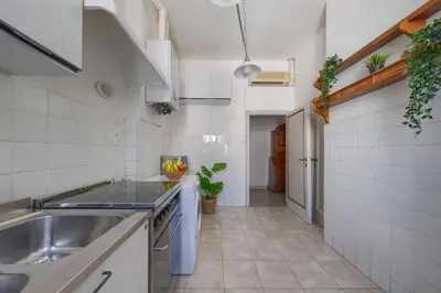 Cucina o angolo cottura di Esclusivo Appartamento Fiorentino 120MQ Netflix, Ac