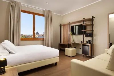 Letto o letti in una camera di Essence Hotel