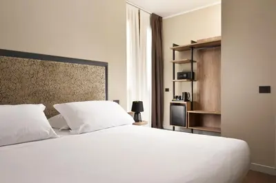 Letto o letti in una camera di Essence Hotel
