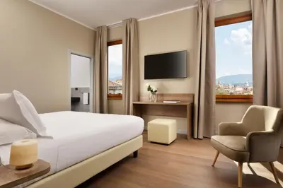 TV o dispositivi per l'intrattenimento presso Essence Hotel