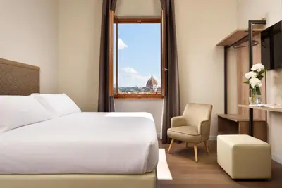 Letto o letti in una camera di Essence Hotel