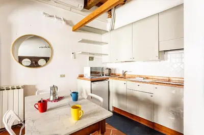 Cucina o angolo cottura di GuestHost - Archi di San Frediano Lovely Apartment