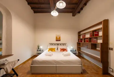 Letto o letti in una camera di Keys of Italy - Maggio 48 -family apartment nearby Pitti Palace