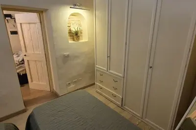 Letto o letti in una camera di Borgo San Frediano Hideaway