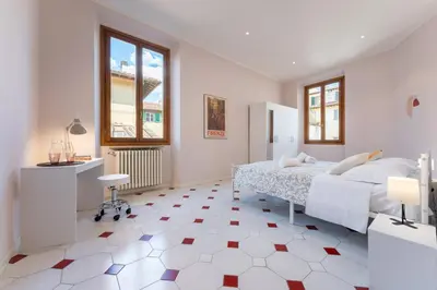 Letto o letti in una camera di Keys of Italy - Alfani 70 - family apartment nearby the Duomo