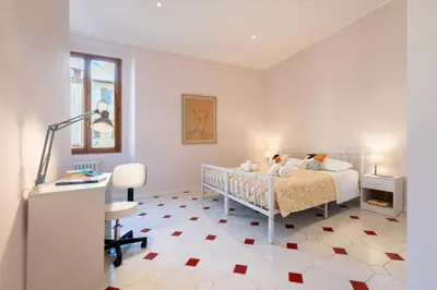 Letto o letti in una camera di Keys of Italy - Alfani 70 - family apartment nearby the Duomo