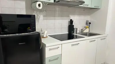 Cucina o angolo cottura di La terrazza segreta di Pupi nel centro storico