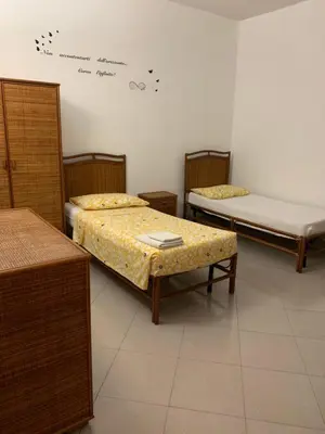 Letto o letti in una camera di Hawaiian Apartment