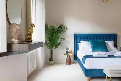 Letto o letti in una camera di ALFANI DUOMO Suite