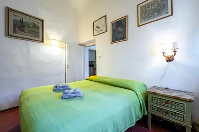 Letto o letti in una camera di Apartment Tacconi - Signorile Appartamento 3BDR by Hôtea