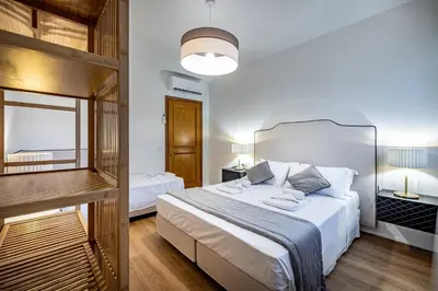 Letto o letti in una camera di YD Morgagni charme apartment