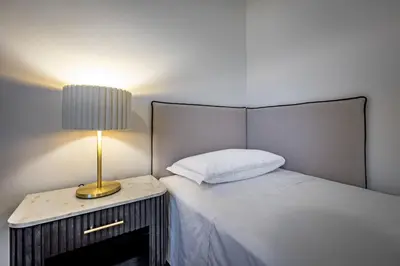 Letto o letti in una camera di YD Morgagni charme apartment