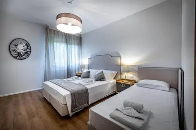 Letto o letti in una camera di YD Morgagni charme apartment