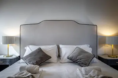 Letto o letti in una camera di YD Morgagni charme apartment