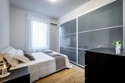 Letto o letti in una camera di YD Aleardi luminous and comfy