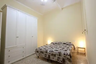 Letto o letti in una camera di Centro Storico