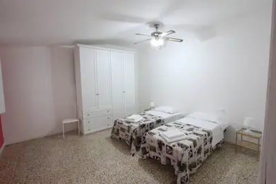 Letto o letti in una camera di Centro Storico